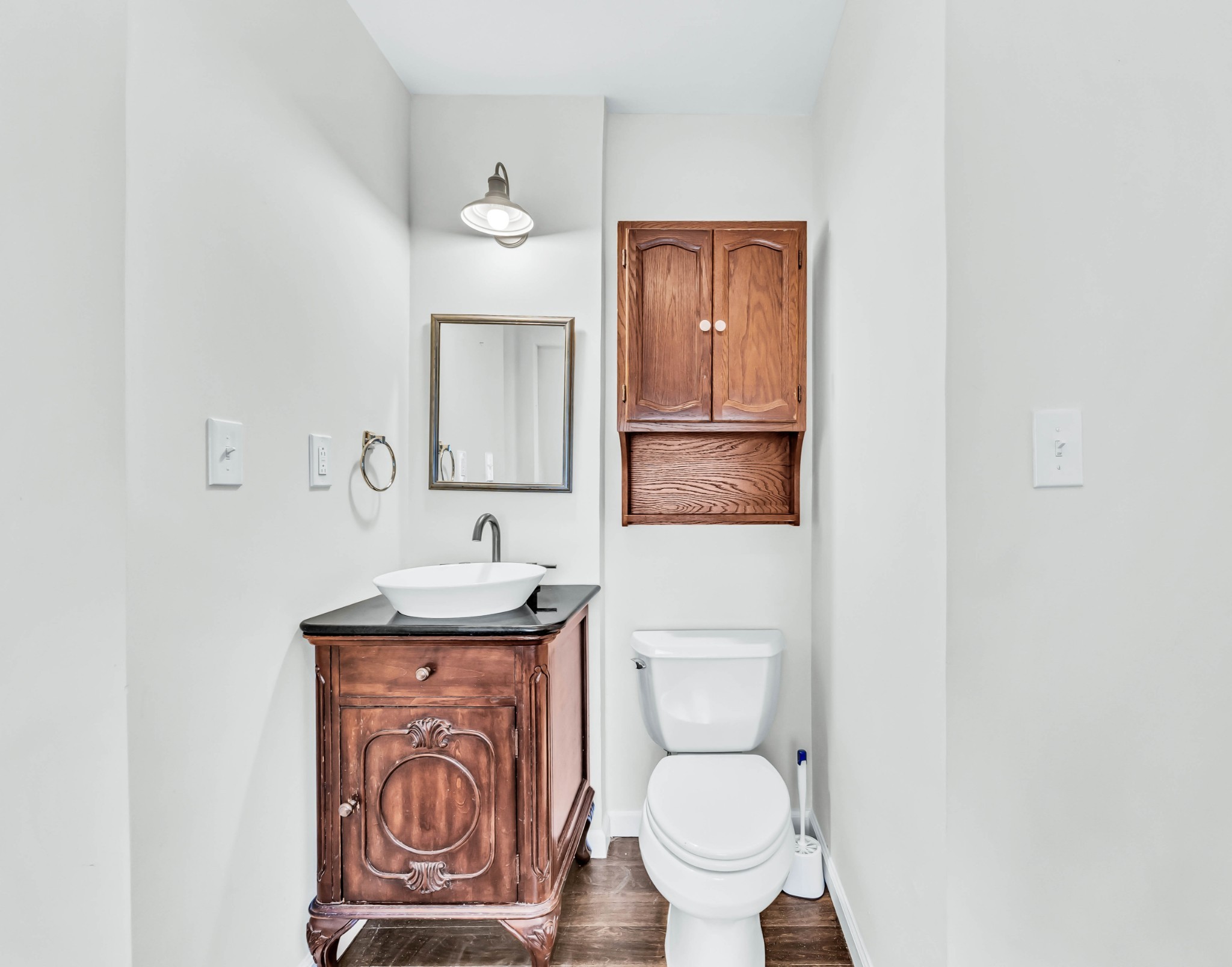 511 Snardon Mill Road Allensville, KY 42204 - Photo 31 of 44 a bathroom with a toilet a sink and mirror