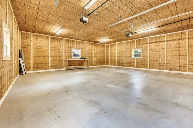 a view of a room with windows