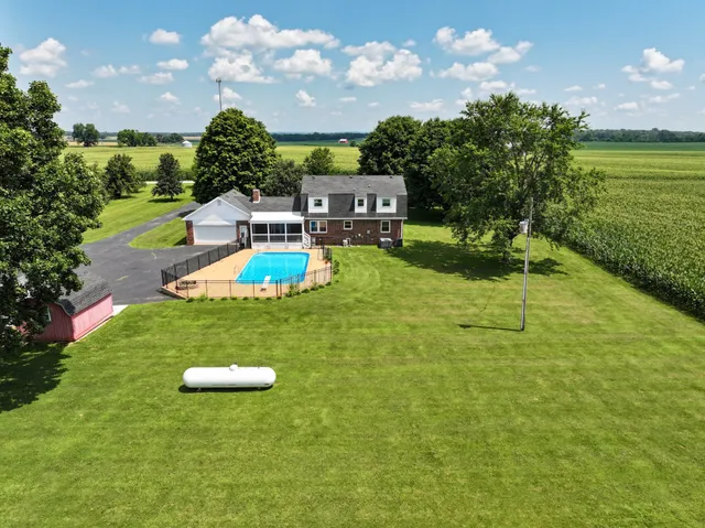 a swimming pool with yard