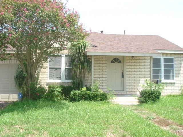 625 Everhart Road Corpus Christi, TX 78412 - Photo 1 of 8 a front view of a house with a yard
