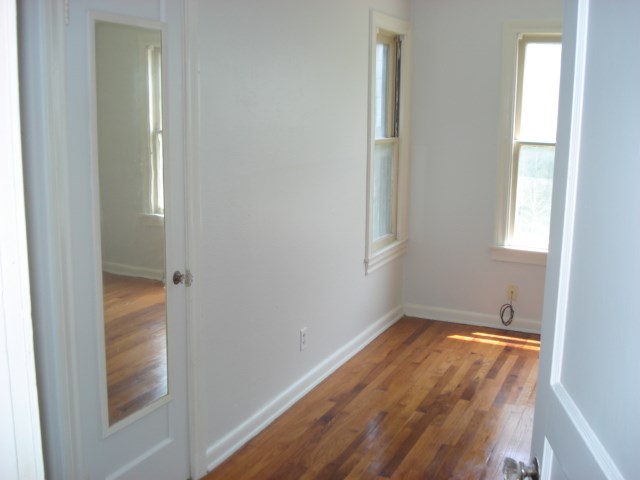 625 Everhart Road Corpus Christi, TX 78412 - Photo 6 of 8 an empty room with windows