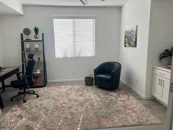 a room with a window and gym equipment