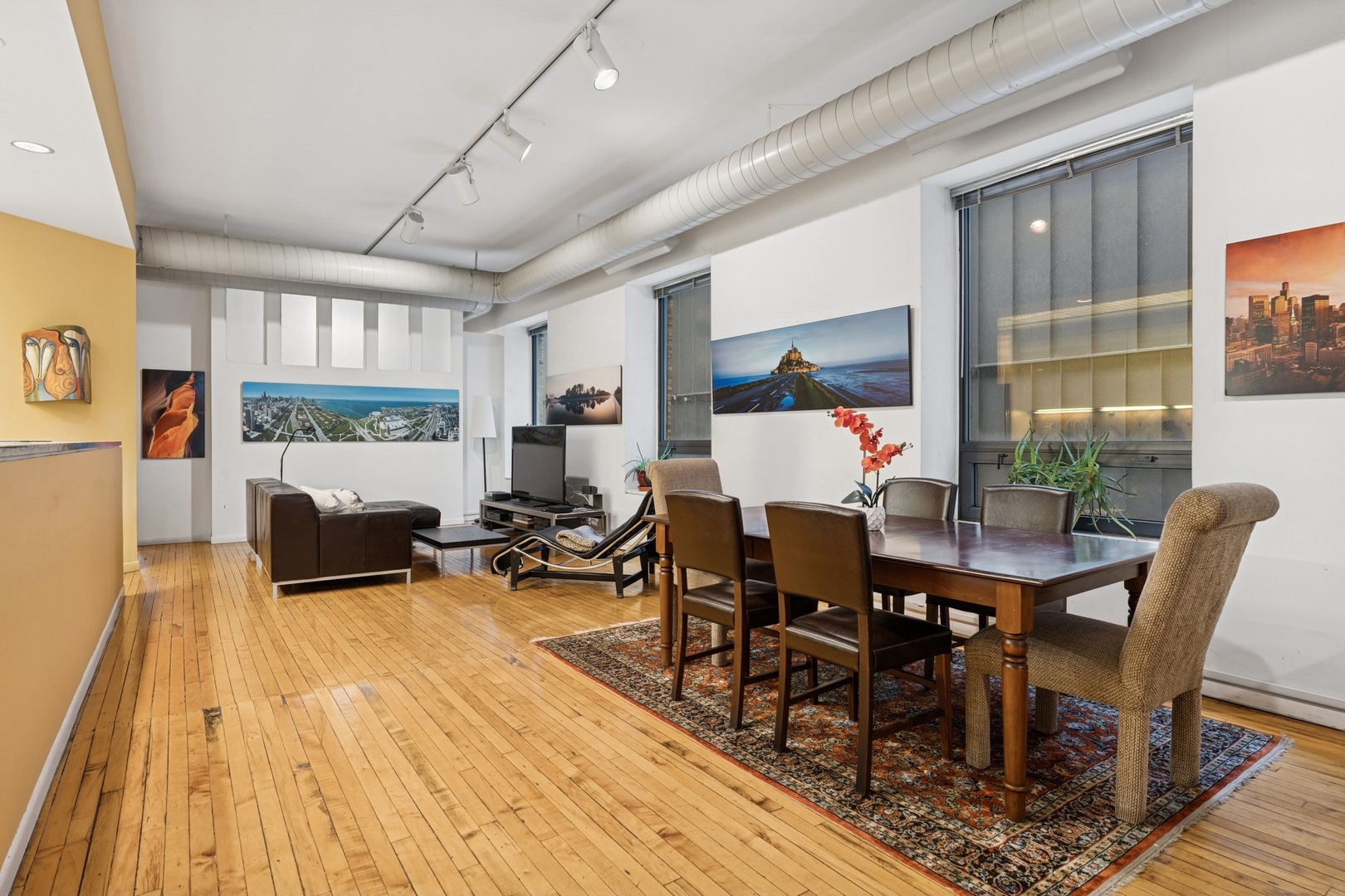 957 West Huron Street, Unit 2 Chicago, IL 60642 - Photo 7 of 26 a living room with furniture and a wooden floor