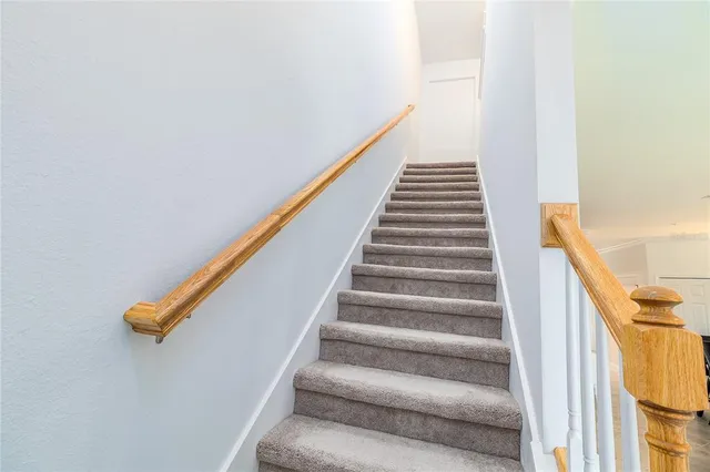 a bathroom with a double vanity sink and mirror