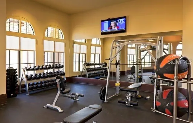 a view of living room with furniture and floor to ceiling window