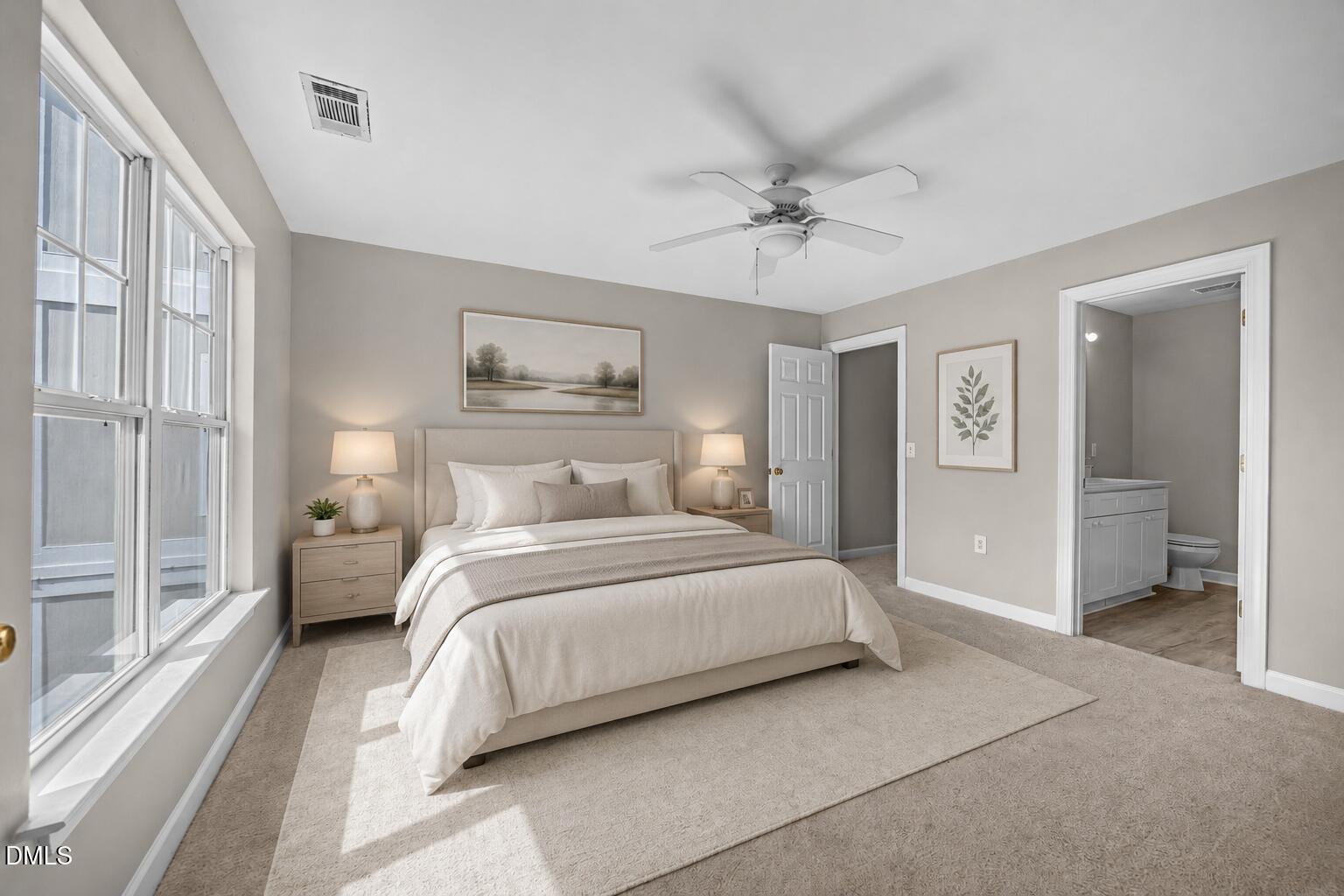 929 Morreene Road, Unit A23 Durham, NC 27705 - Photo 23 of 41 a bedroom with a bed and a chandelier
