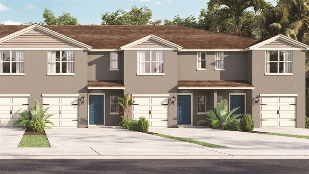 2147 Longleaf Road Davenport, FL 33837 - Photo 1 of 1 a front view of a house with a yard and garage