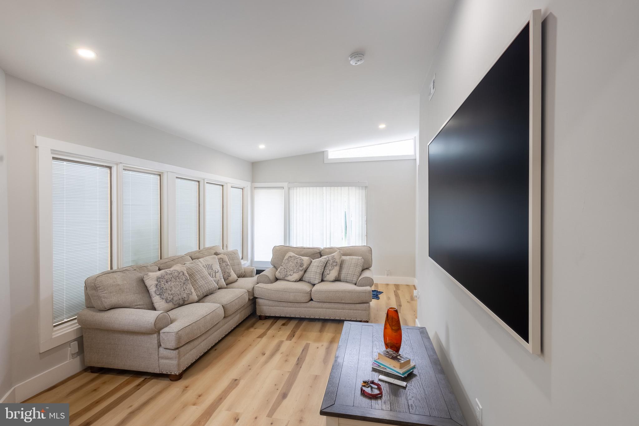 37 4th Street Laurel, MD 20707 - Photo 6 of 26 a living room with furniture and a couch