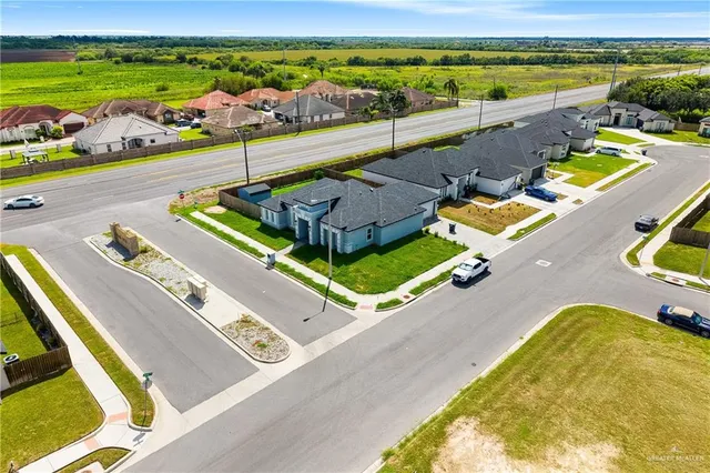 a view of a swimming pool with a lounge chairs