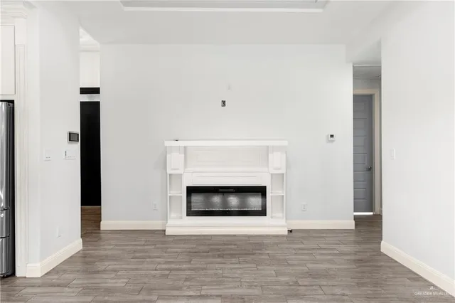 a living room with a fireplace