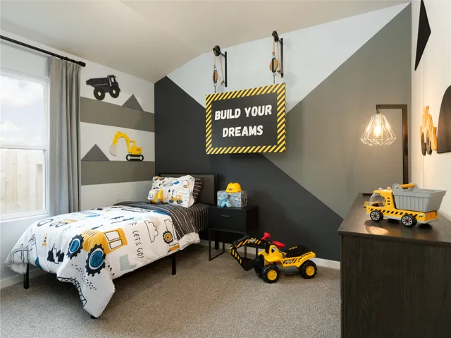 a bedroom with bed and a window