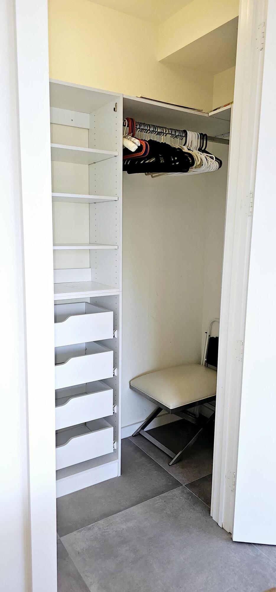 365 Southeast 6th Avenue, Unit 305 Delray Beach, FL 33483 - Photo 25 of 49 a view of walk in closet with empty racks