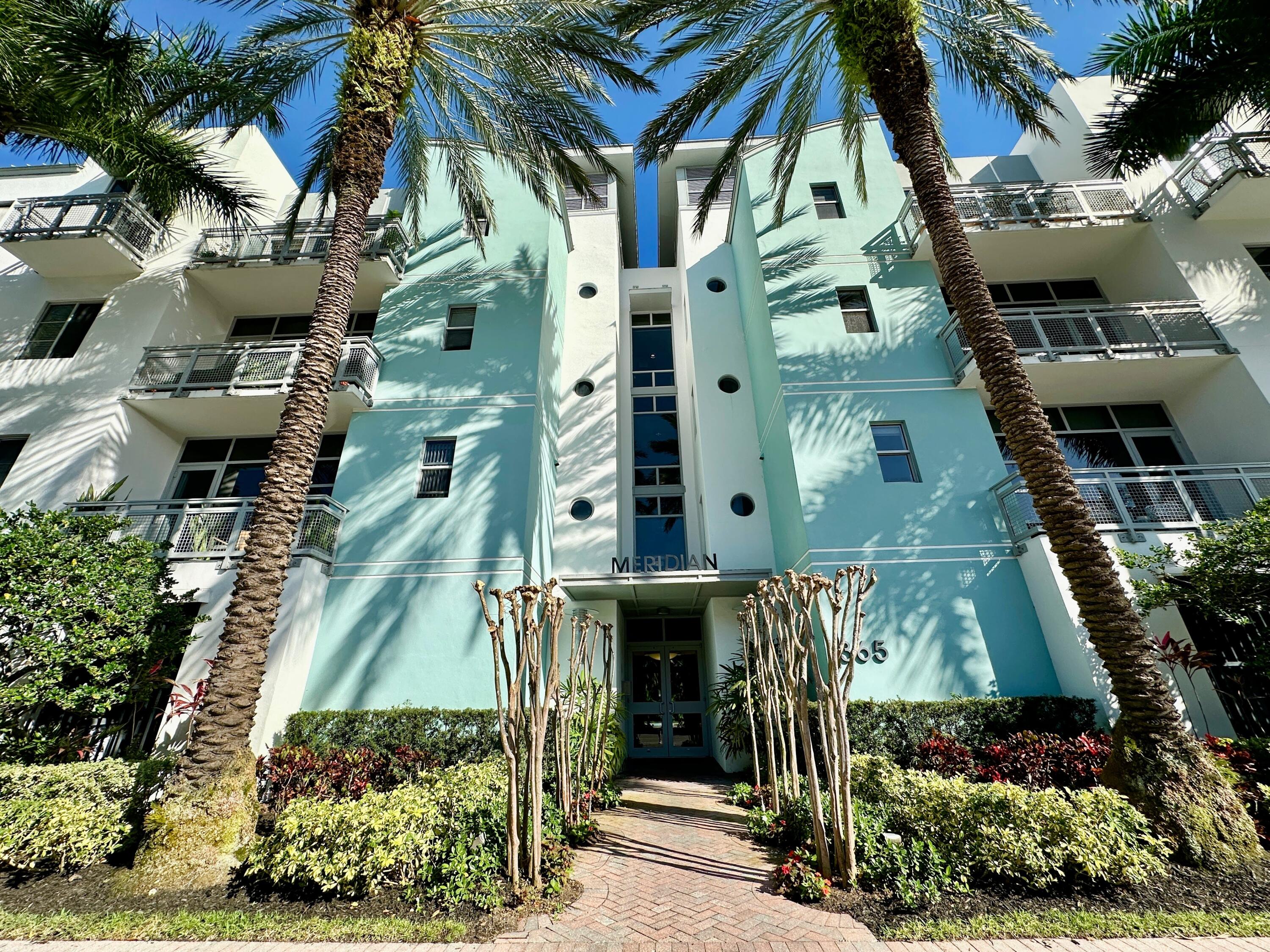 365 Southeast 6th Avenue, Unit 305 Delray Beach, FL 33483 - Photo 3 of 49 an aerial view of residential houses with outdoor space
