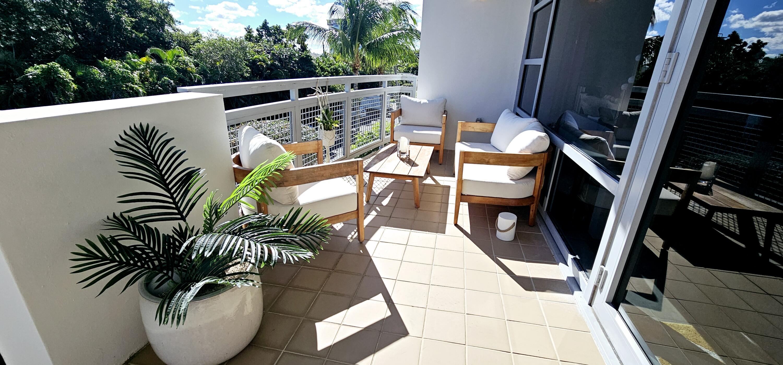 365 Southeast 6th Avenue, Unit 305 Delray Beach, FL 33483 - Photo 34 of 49 a view of outdoor space with chairs