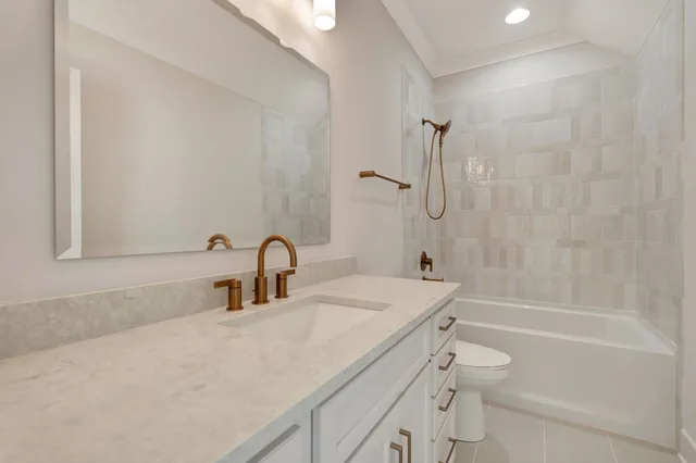 a front view of a house with yard and garage