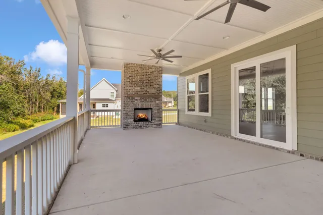 an aerial view of residential house with outdoor space and swimming pool