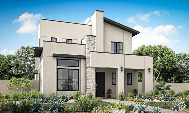 636 Phase 6 Street St. George, UT 84790 - Photo 1 of 16 Modern exterior with a light stucco finish, stone accent column, and prominent flat roofline