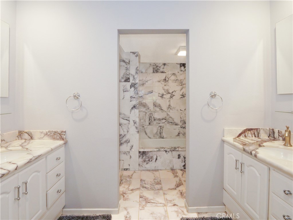 736 Gould Avenue, Unit 26 Hermosa Beach, CA 90254 - Photo 24 of 39 a bathroom with a sink a vanity and shower