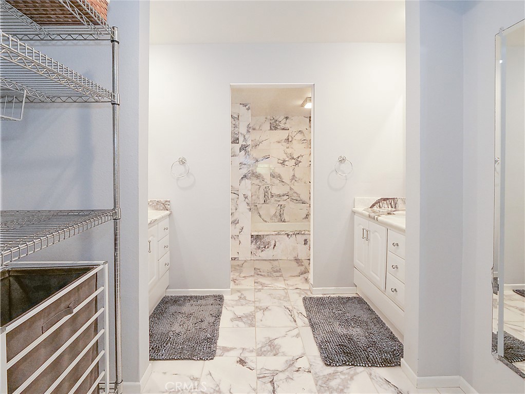 736 Gould Avenue, Unit 26 Hermosa Beach, CA 90254 - Photo 28 of 39 a bathroom with a shower and a sink