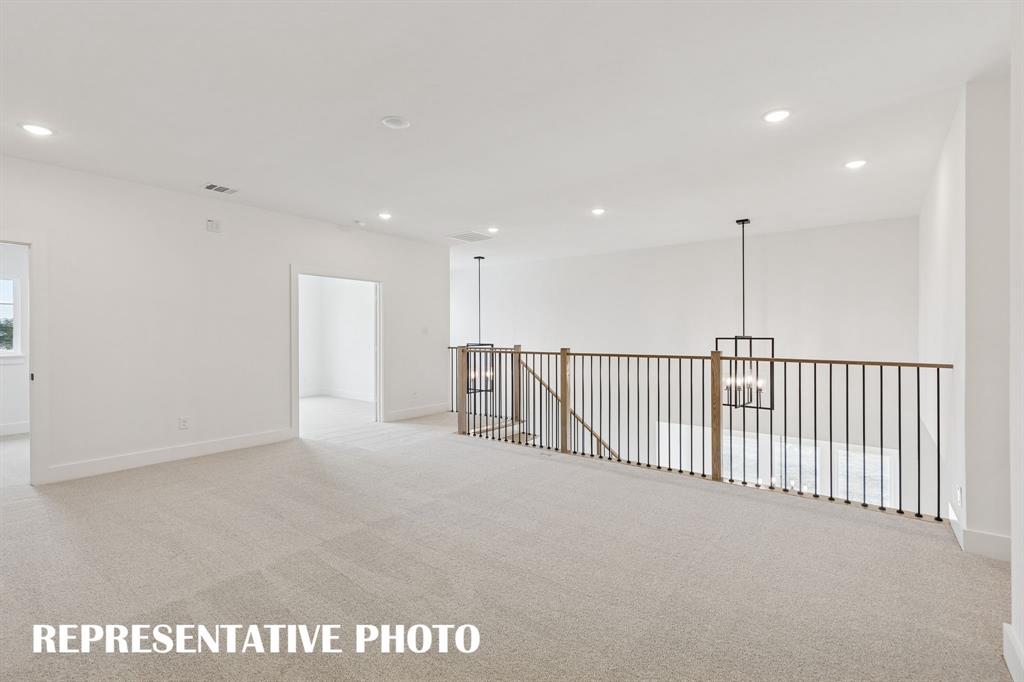 2122 Wakefield Lane Allen, TX 75013 - Photo 13 of 19 You'll enjoy never ending family fun time in this spacious, light filled game room. REPRESENTATIVE PHOTO