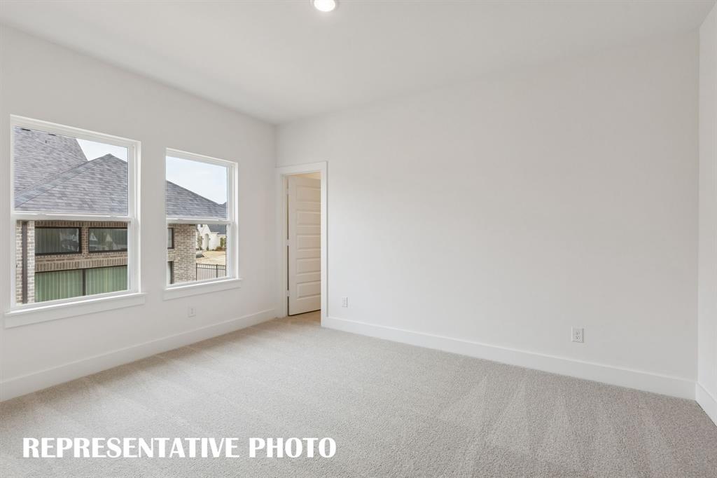 2122 Wakefield Lane Allen, TX 75013 - Photo 15 of 19 You'll find nicely sized secondary bedrooms in our Reese II plan. REPRESENTATIVE PHOTO