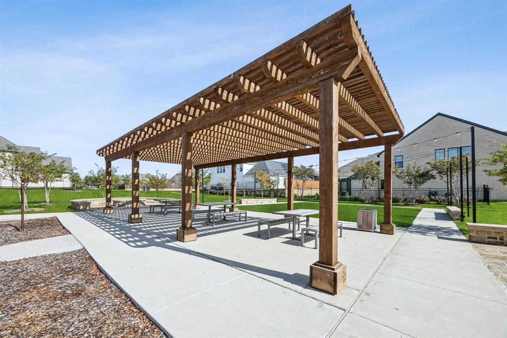 2122 Wakefield Lane Allen, TX 75013 - Photo 17 of 19 Whether it's lively neighborhood fun or just quite time, this outdoor area offers plenty of space for friends to gather!