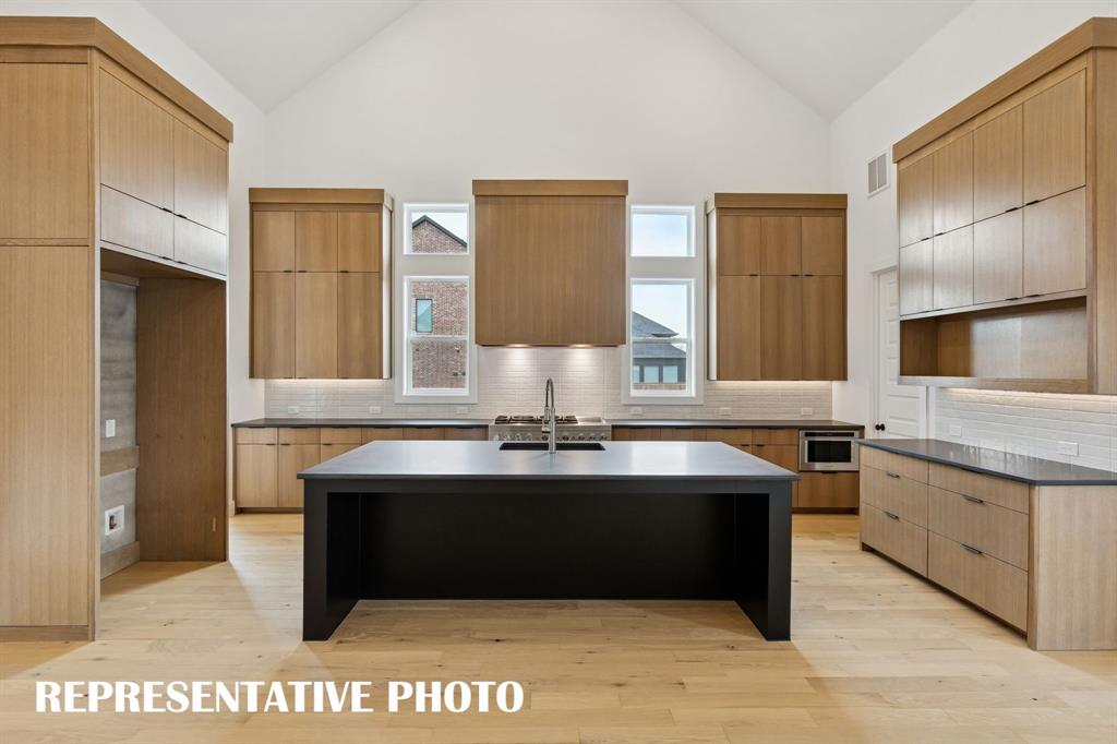 2122 Wakefield Lane Allen, TX 75013 - Photo 5 of 19 Truly a chef's dream kitchen! REPRESENTATIVE PHOTO