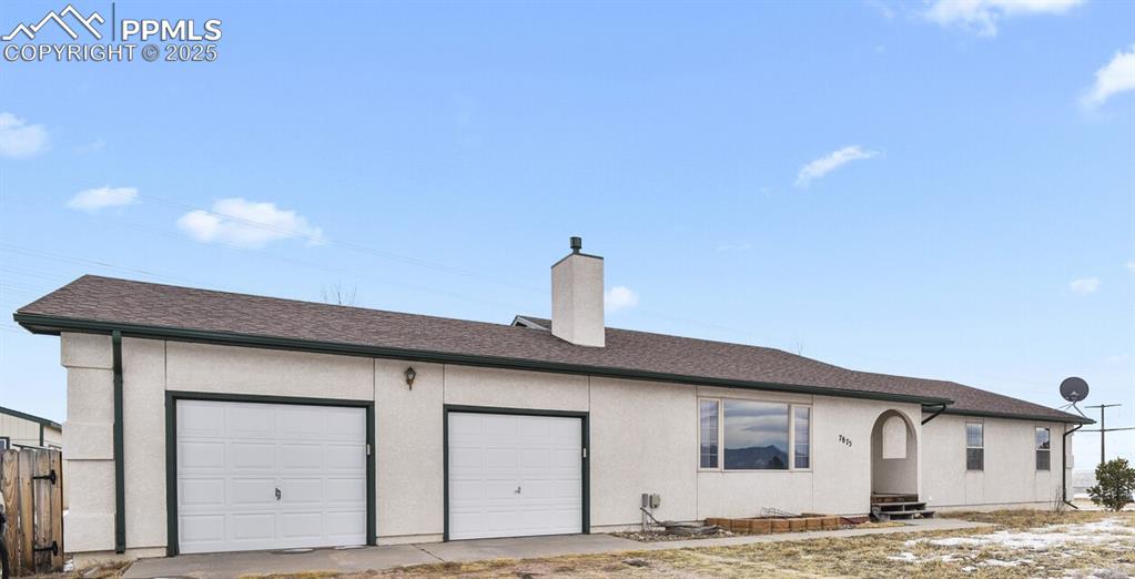 a house that has a window in front of it