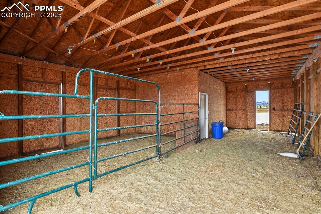 7875 Falcon Meadows Boulevard Peyton, CO 80831 - Photo 34 of 50 a view of a room with shelves