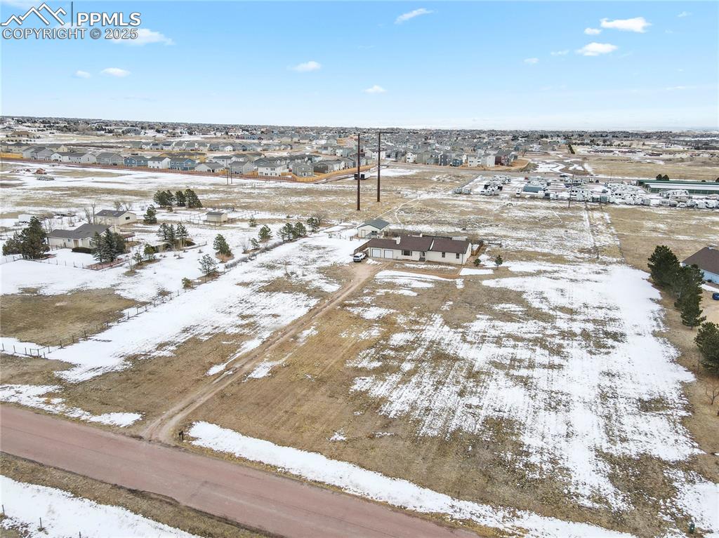 7875 Falcon Meadows Boulevard Peyton, CO 80831 - Photo 42 of 50 a view of an ocean beach