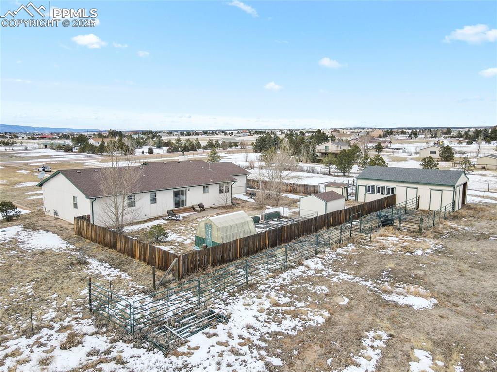 7875 Falcon Meadows Boulevard Peyton, CO 80831 - Photo 43 of 50 a view of a terrace with lawn chairs