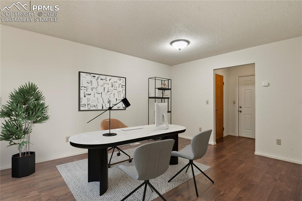 7875 Falcon Meadows Boulevard Peyton, CO 80831 - Photo 10 of 50 a view of a workspace with furniture