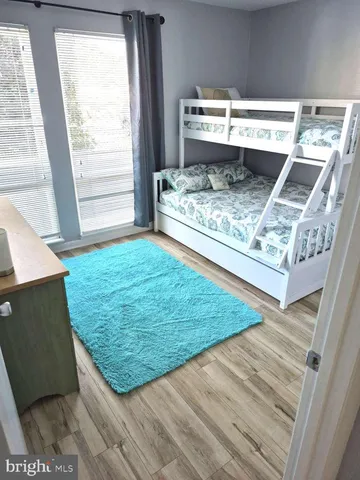 a view of a living room and a rug