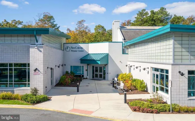 a view of a chairs and table in the patio