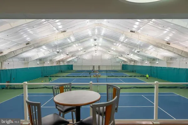 a view of a swimming pool with a lake view