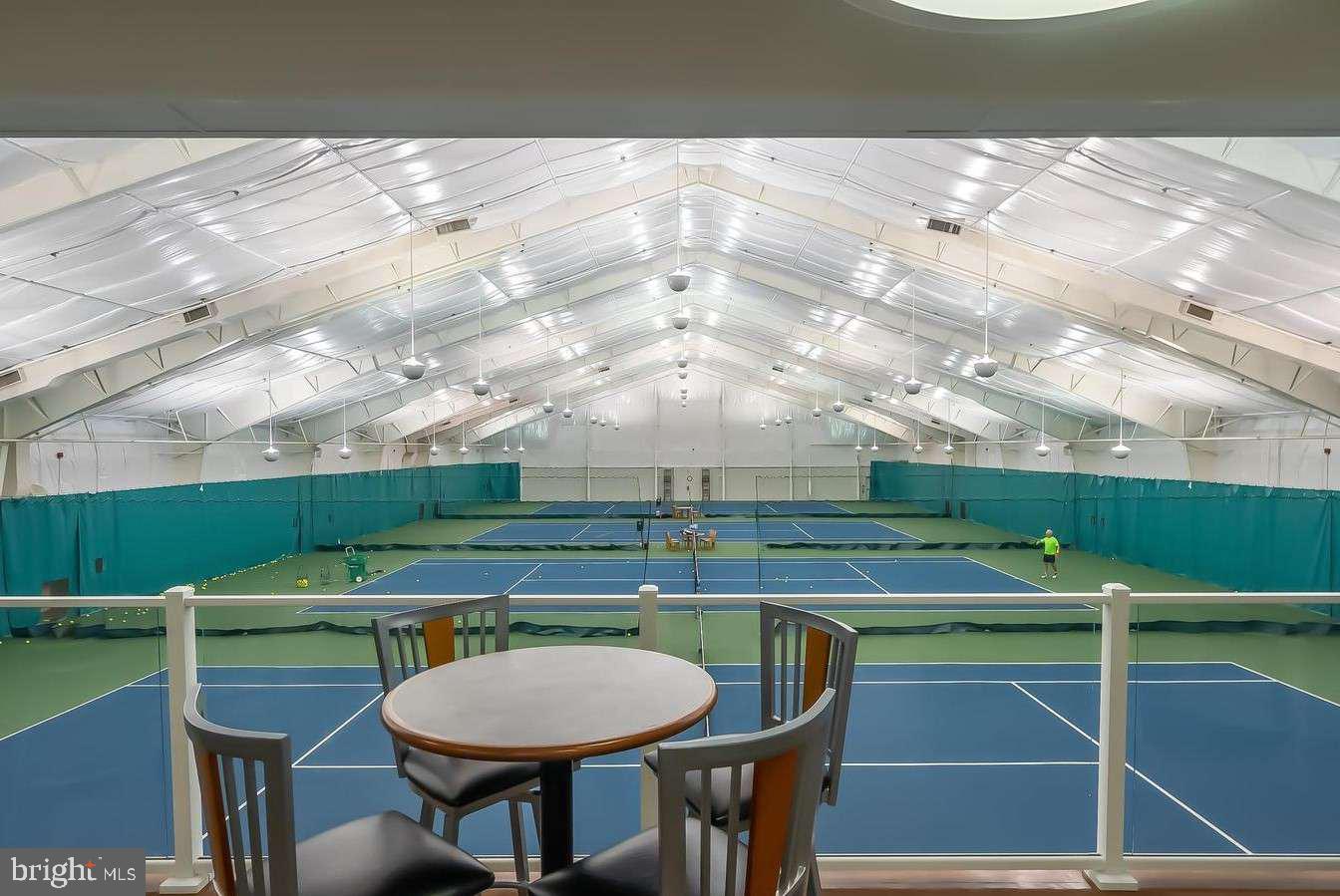39633 Round Robin Way, Unit 2602 Bethany Beach, DE 19930 - Photo 41 of 43 a view of a chairs and table in the patio