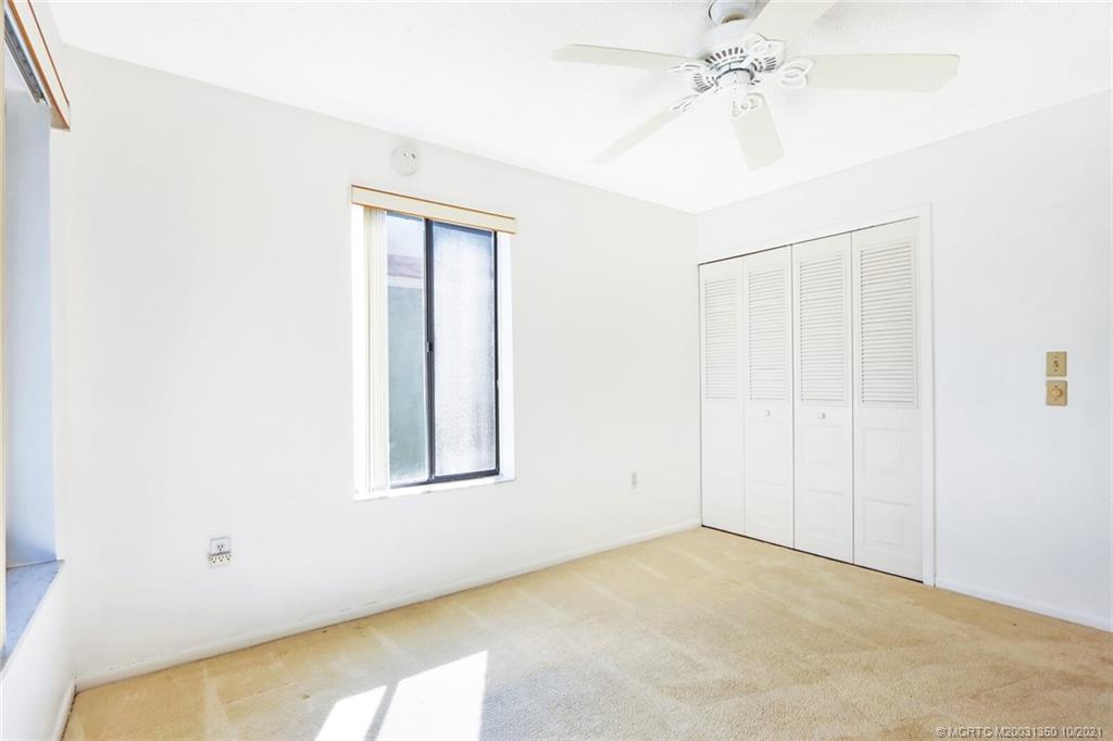 5443 Southeast Miles Grant Road, Unit D205 Stuart, FL 34997 - Photo 26 of 44 Spacious Guest/2nd BedRoom