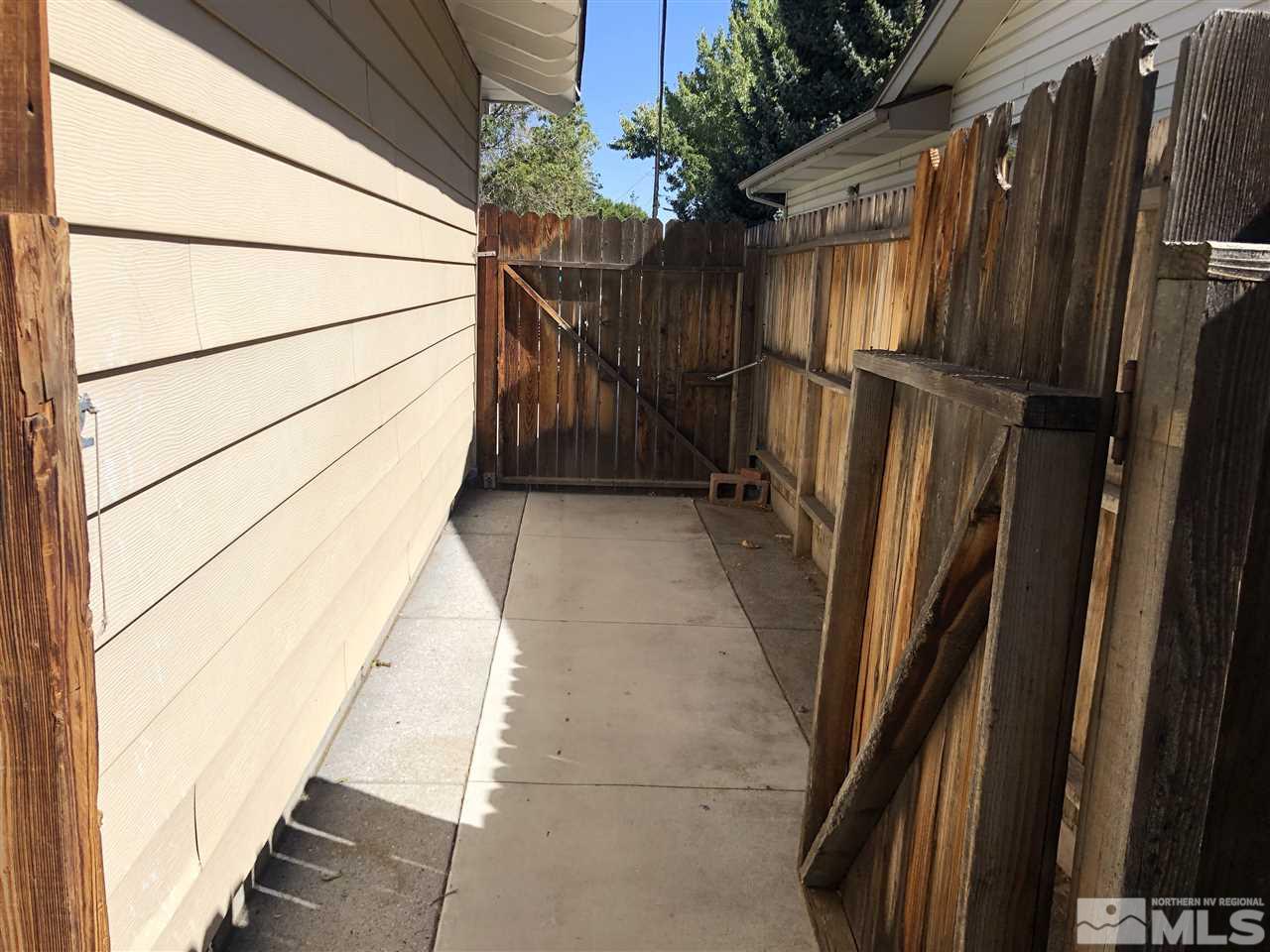 695 Ibis Lane Reno, NV 89503 - Photo 13 of 14 a view of a house with a wooden door