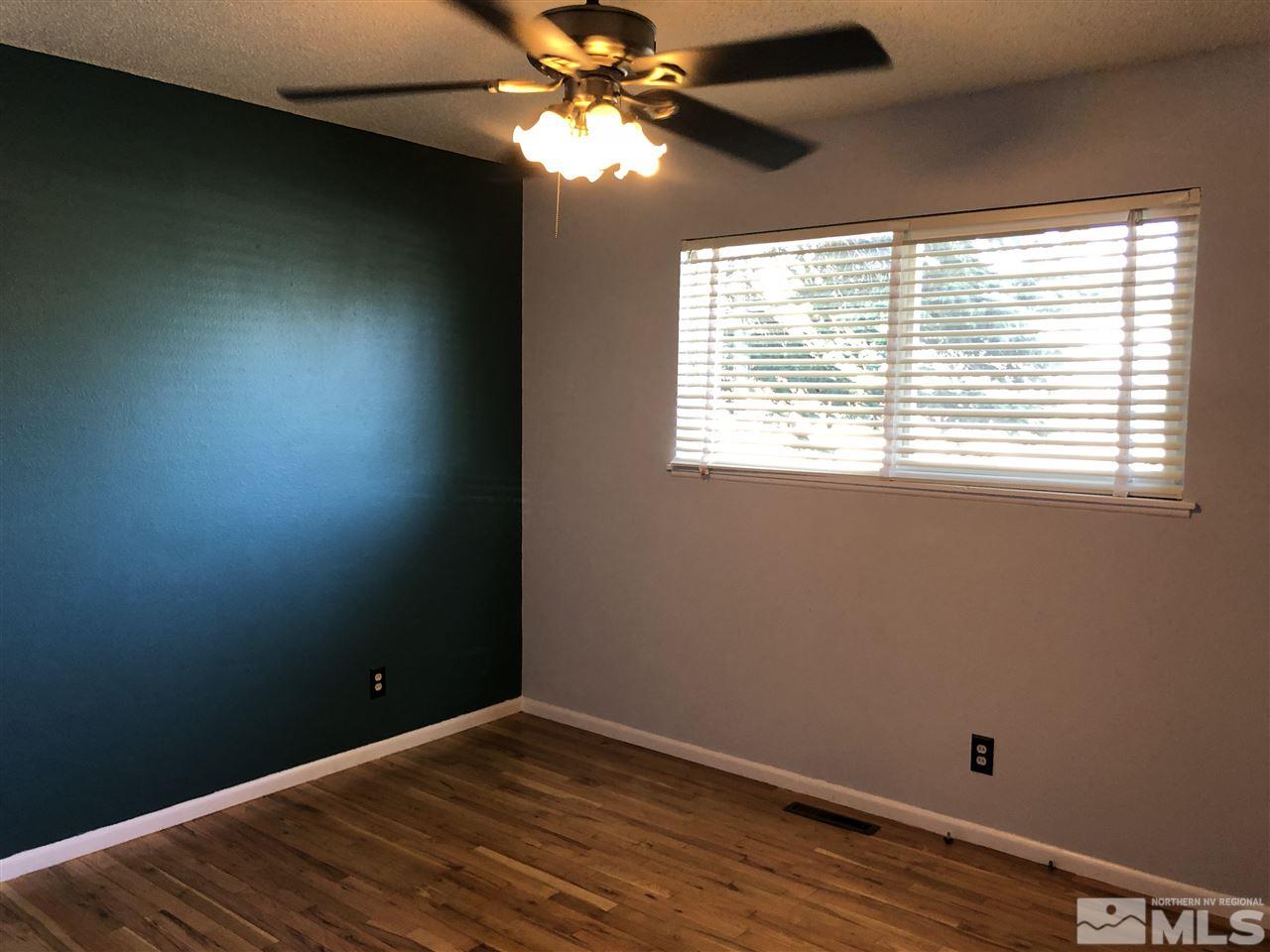 695 Ibis Lane Reno, NV 89503 - Photo 7 of 14 a view of an empty room with a window