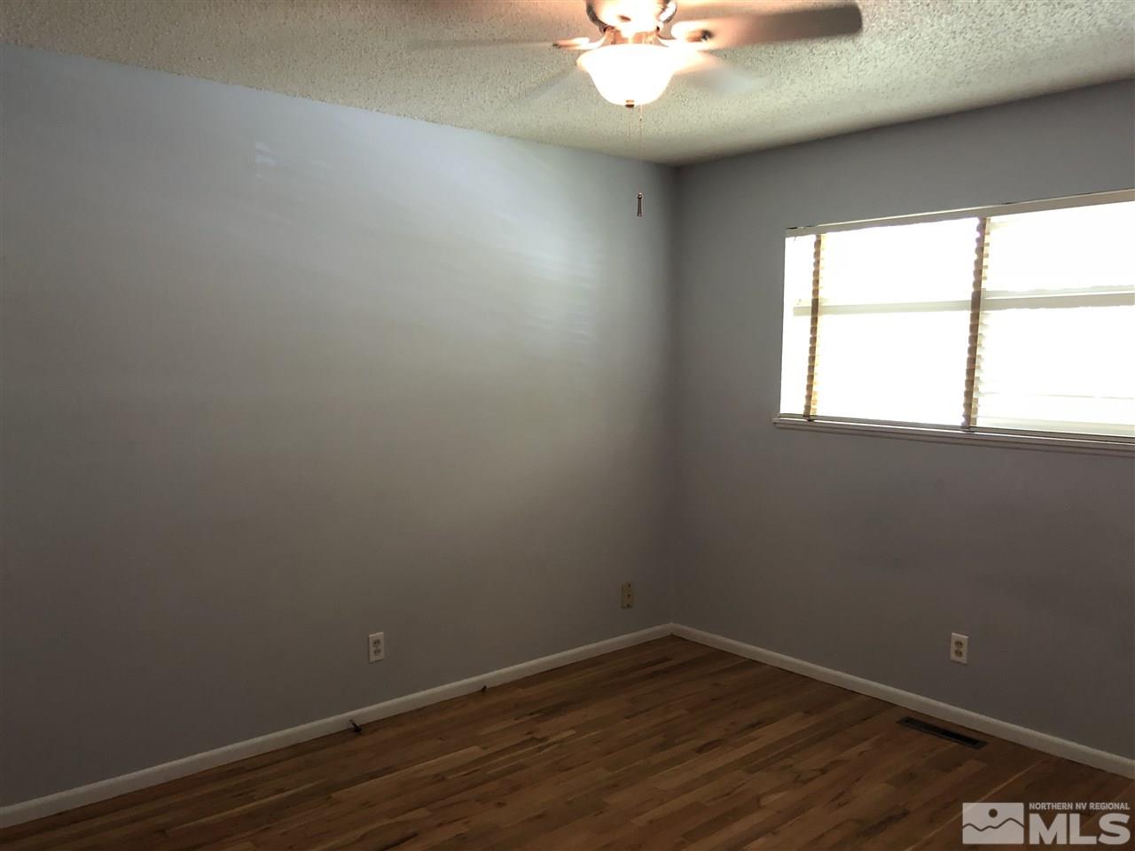695 Ibis Lane Reno, NV 89503 - Photo 9 of 14 an empty room with a window