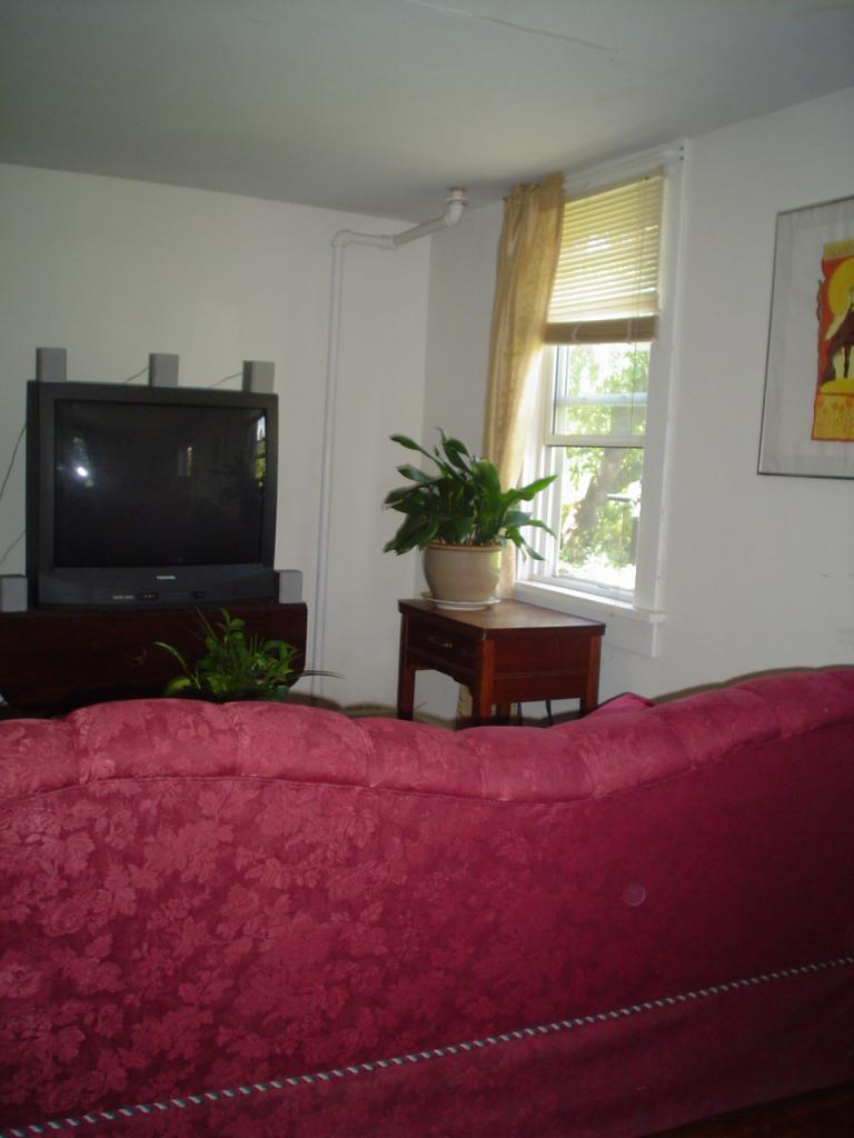 12 West Stockbridge Road Stockbridge, MA 01262 - Photo 11 of 12 a living room with furniture and a flat screen tv