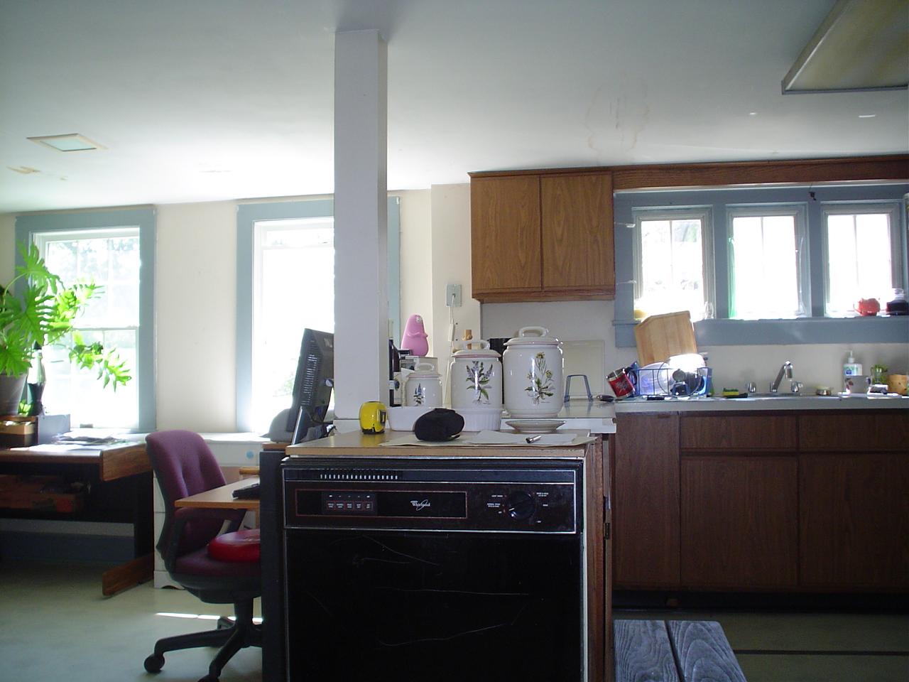 12 West Stockbridge Road Stockbridge, MA 01262 - Photo 9 of 12 a kitchen with a stove a sink and a window