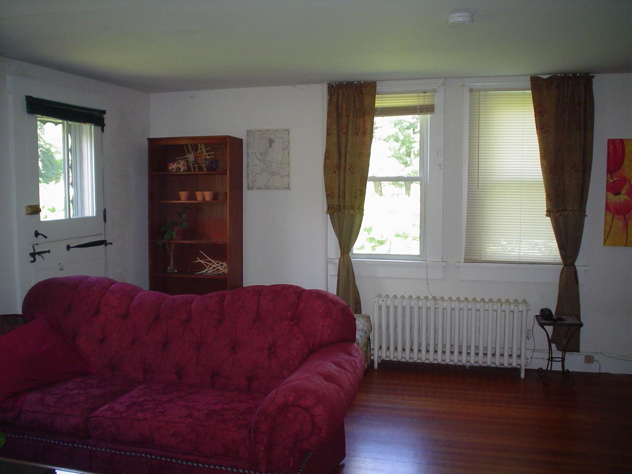 12 West Stockbridge Road Stockbridge, MA 01262 - Photo 10 of 12 a living room with a couch and a window