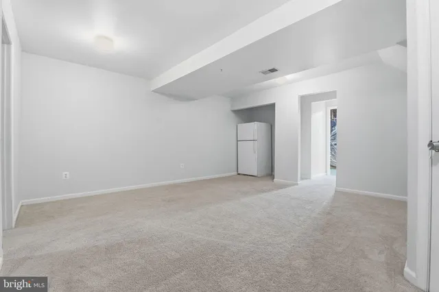 an empty room with a natural light