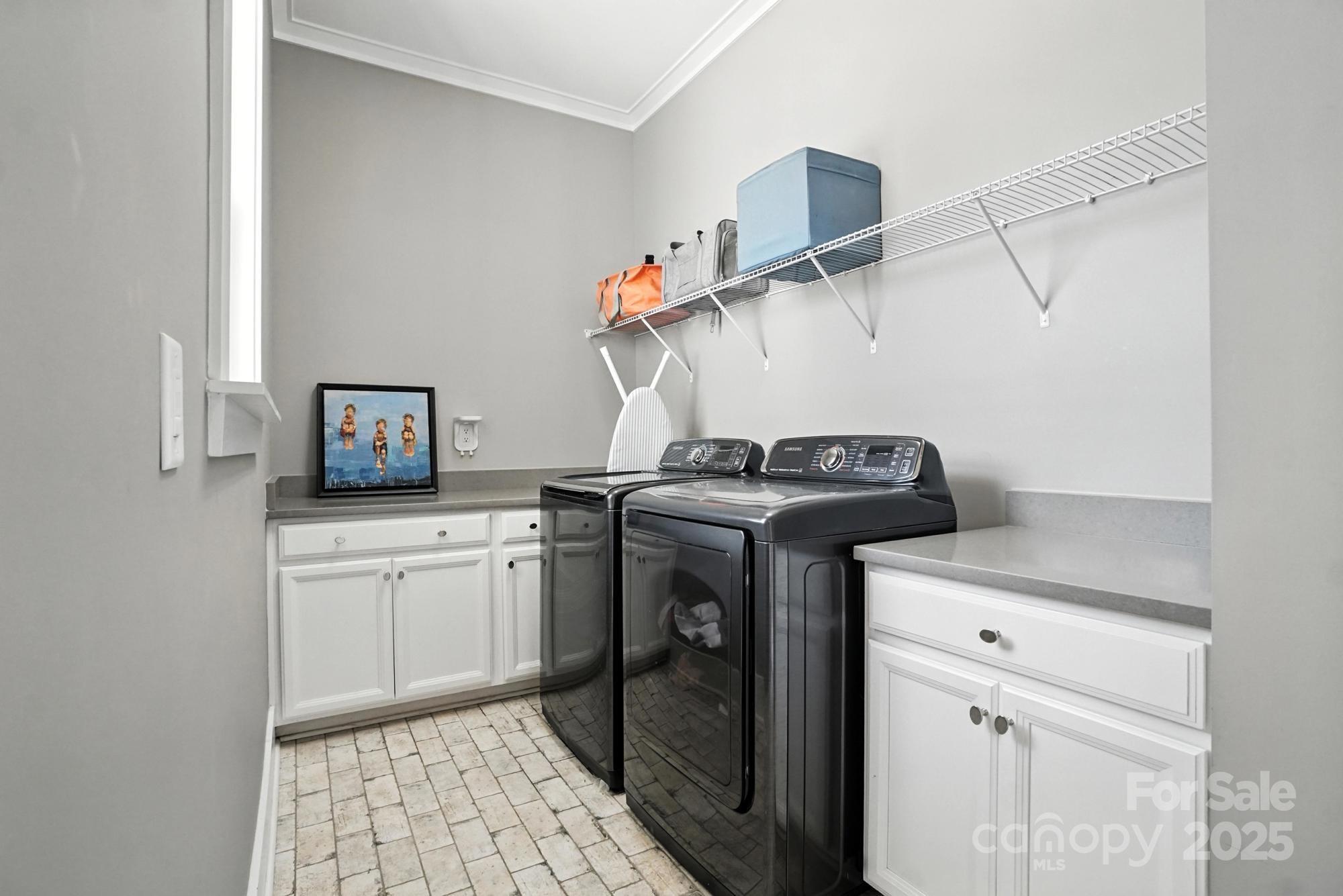 1908 Masons Bend Drive Fort Mill, SC 29708 - Photo 25 of 45 a utility room with dryer and washer