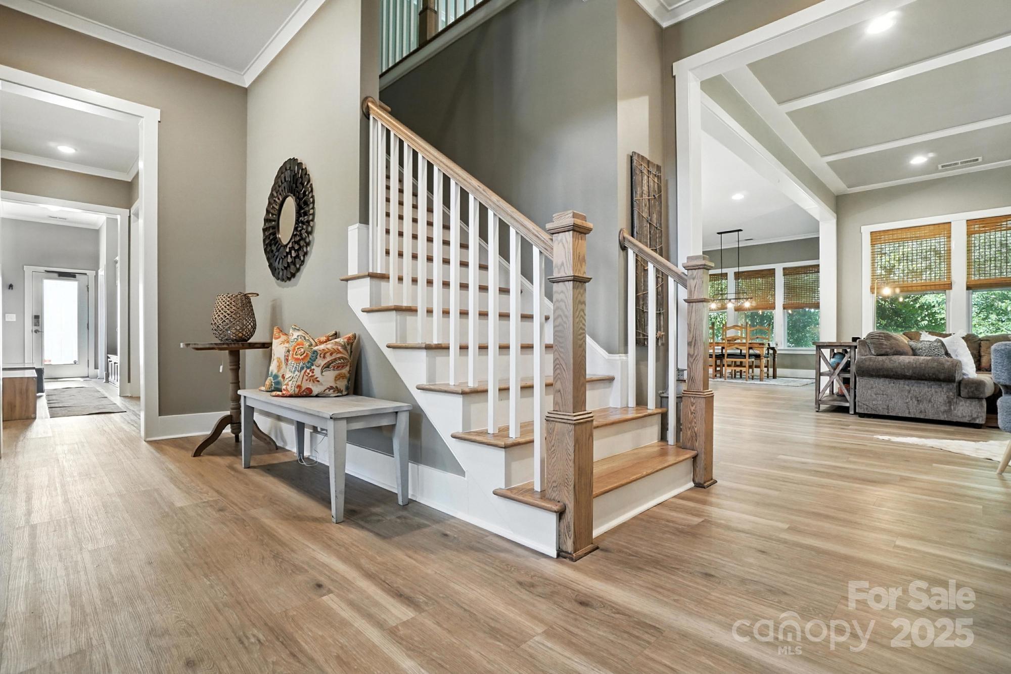 1908 Masons Bend Drive Fort Mill, SC 29708 - Photo 26 of 45 a living room with wooden floor furniture and windows