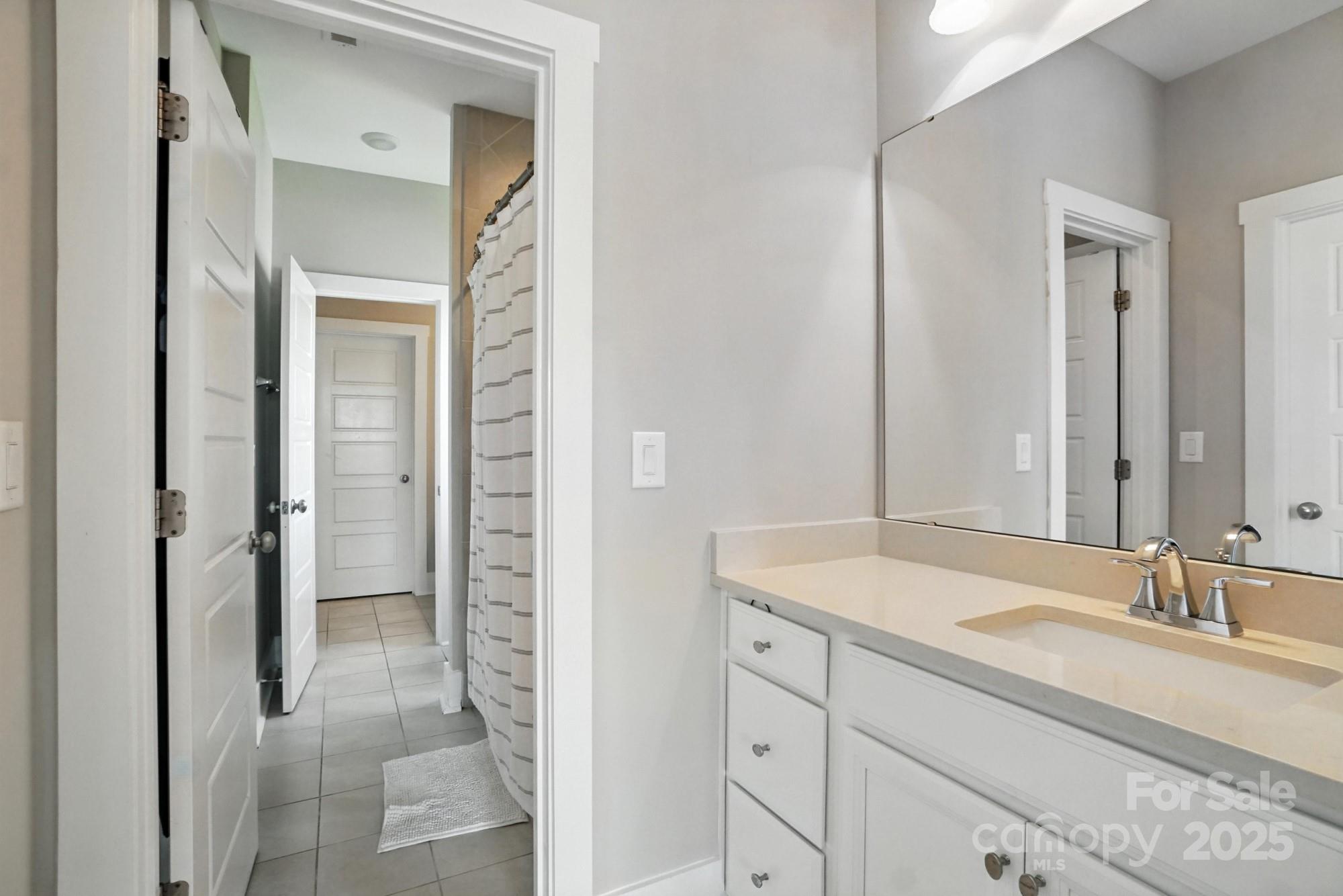 1908 Masons Bend Drive Fort Mill, SC 29708 - Photo 31 of 45 a bathroom with a sink and a mirror