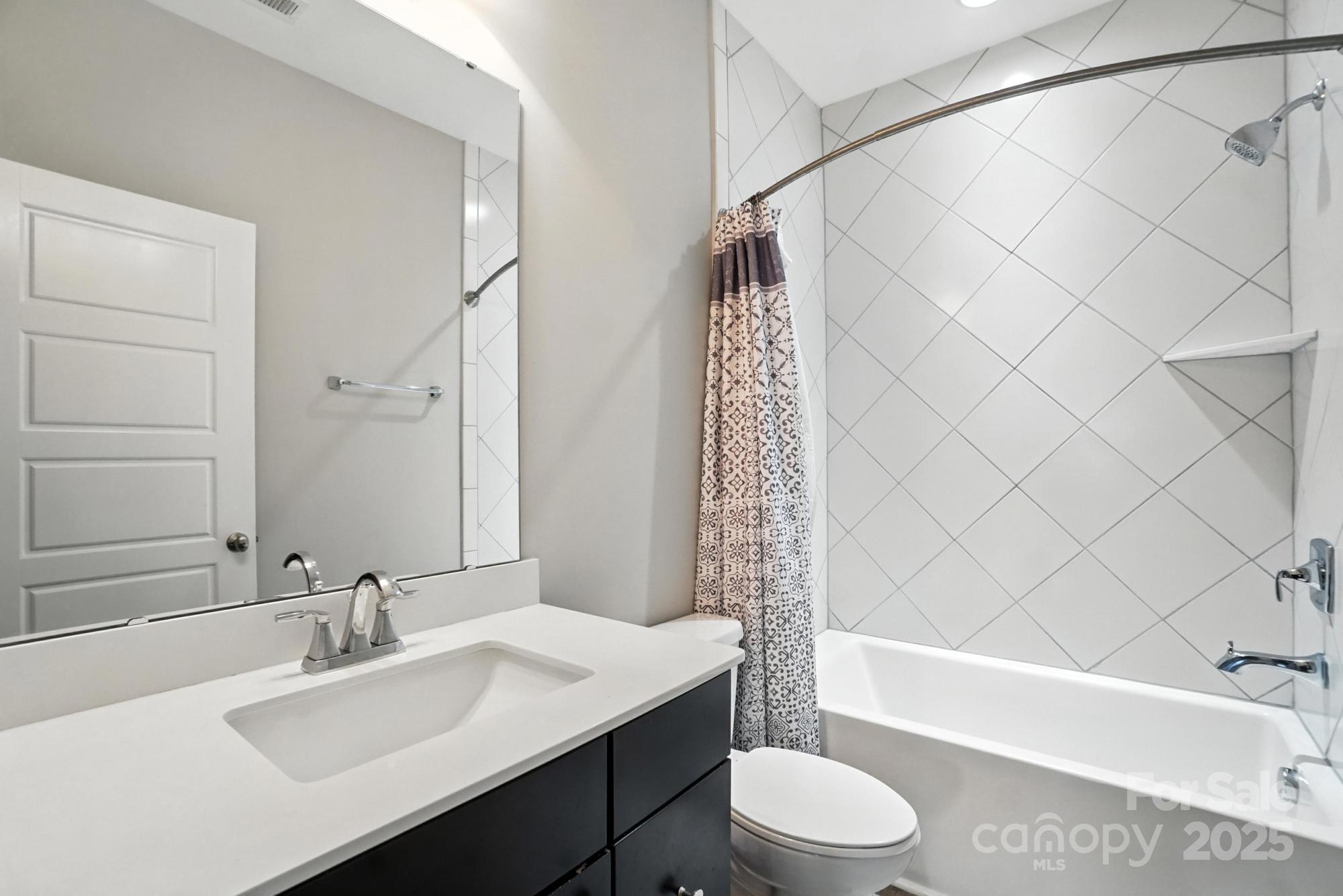 1908 Masons Bend Drive Fort Mill, SC 29708 - Photo 34 of 45 a bathroom with a sink toilet and shower