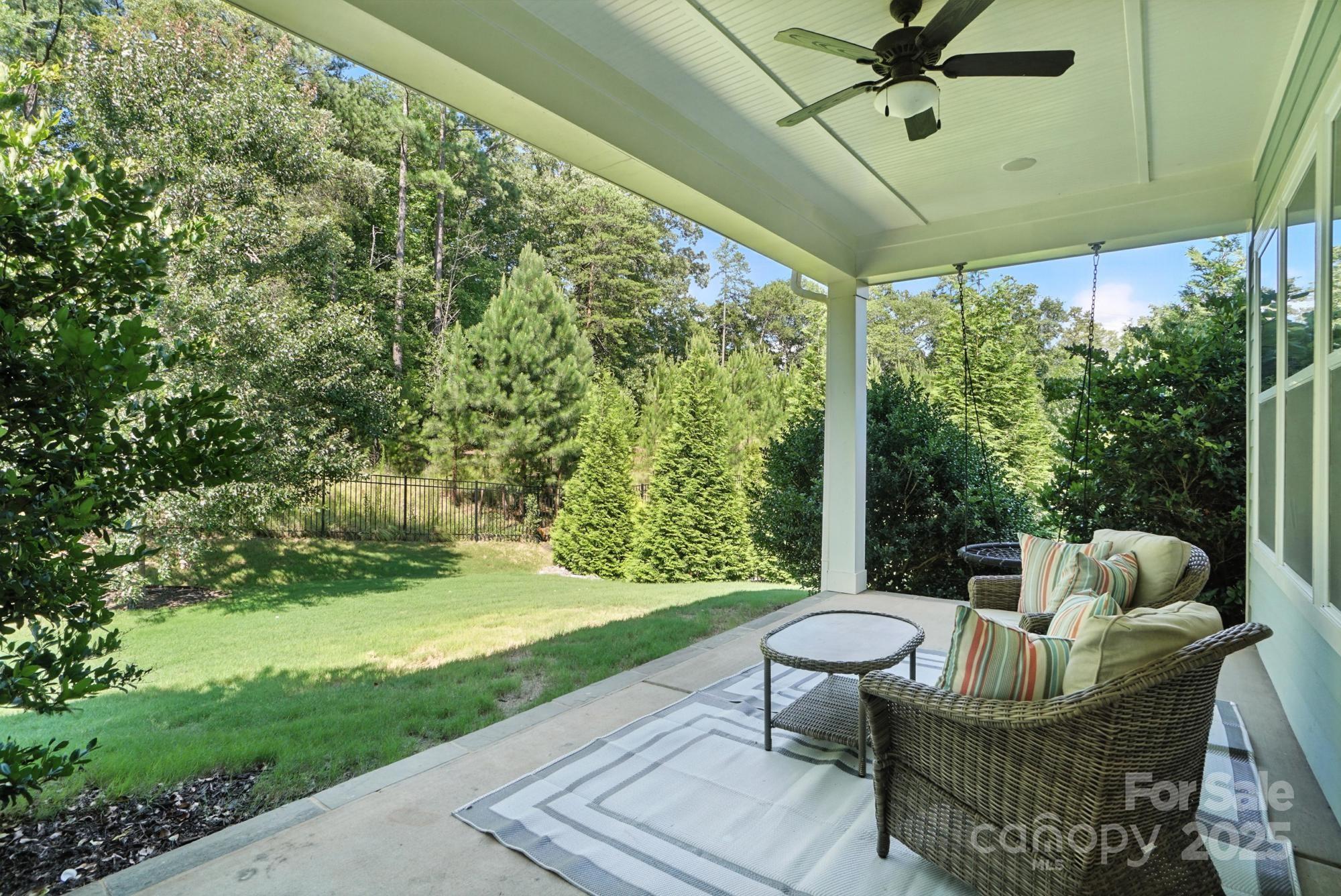 1908 Masons Bend Drive Fort Mill, SC 29708 - Photo 35 of 45 a view of a porch with furniture and a yard