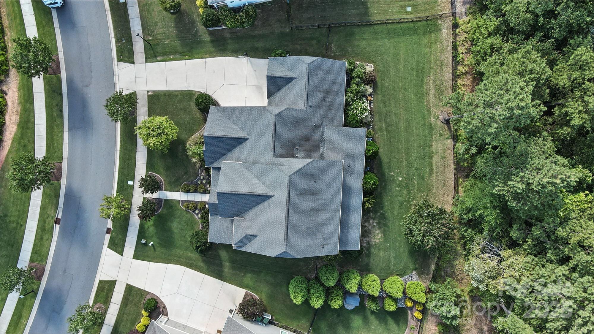 1908 Masons Bend Drive Fort Mill, SC 29708 - Photo 4 of 45 an aerial view of a house with a yard basket ball court and outdoor seating